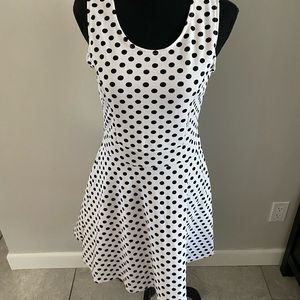 White with black polka dot mini dress.